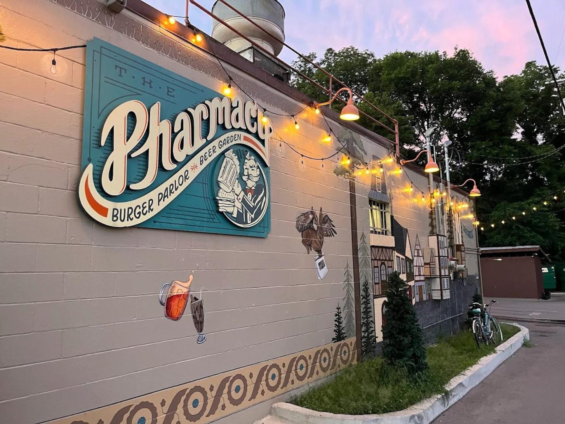 The Pharmacy's mural wall and string lights in East Nashville