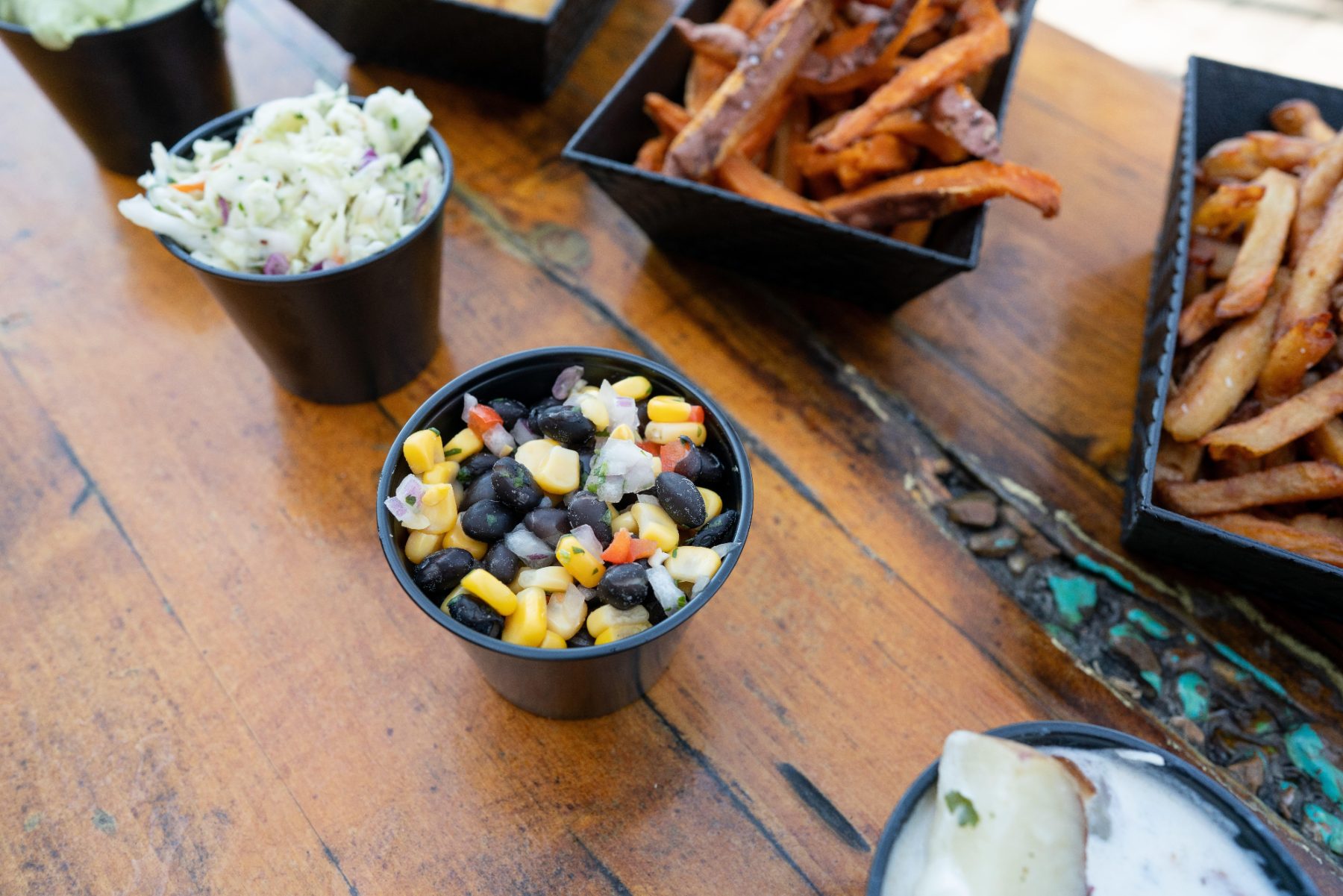 Black bean and corn salad with fries
